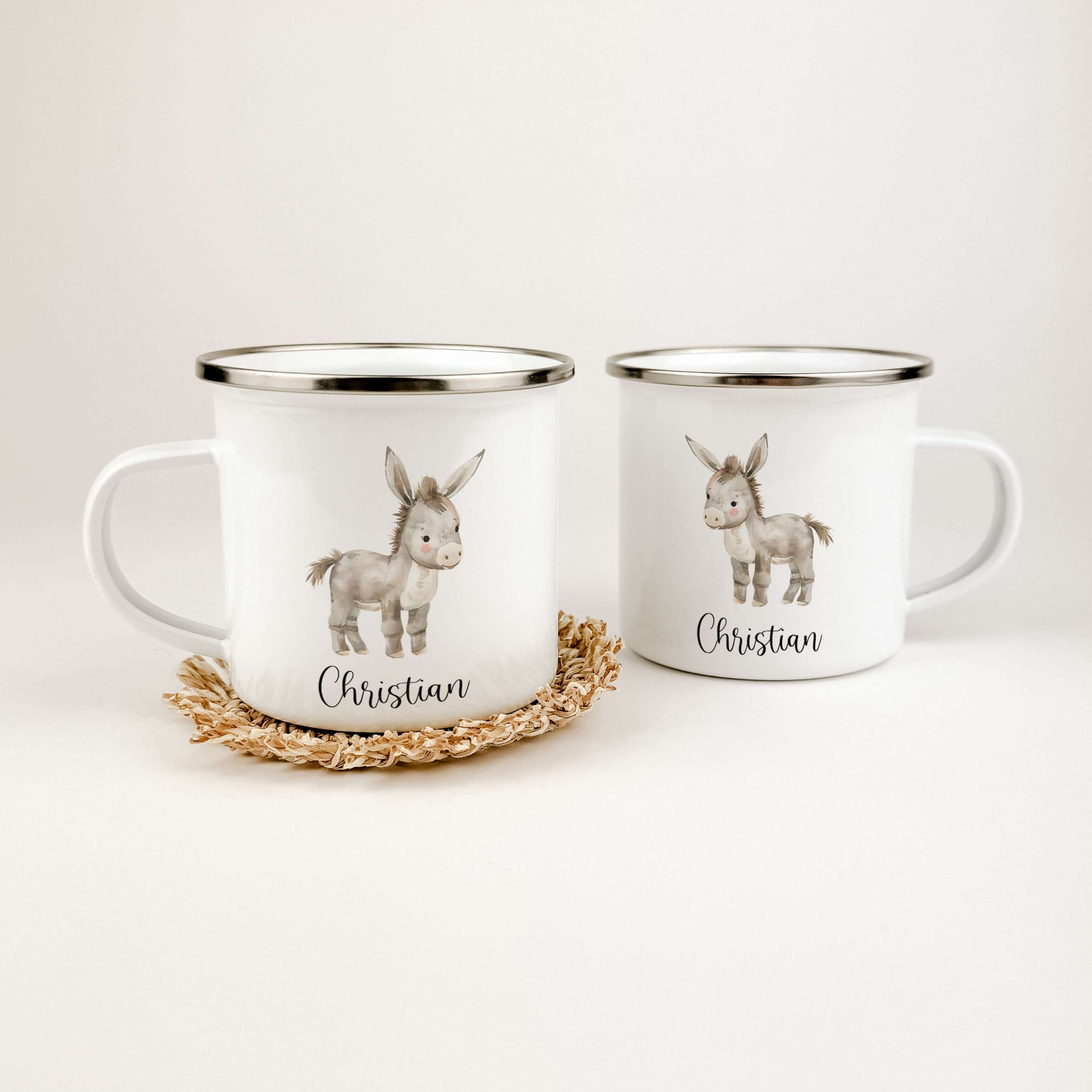 Emaille Tasse Esel-famprints-Emaille Tasse-Entdecke die zauberhafte Emaille Tasse Esel von famprints – das perfekte Geschenk für kleine Entdecker! Diese personalisierte Tasse bringt mit ihrem süßen Aquarell-Esel nicht nur Freude ins Kinderzimmer, sondern