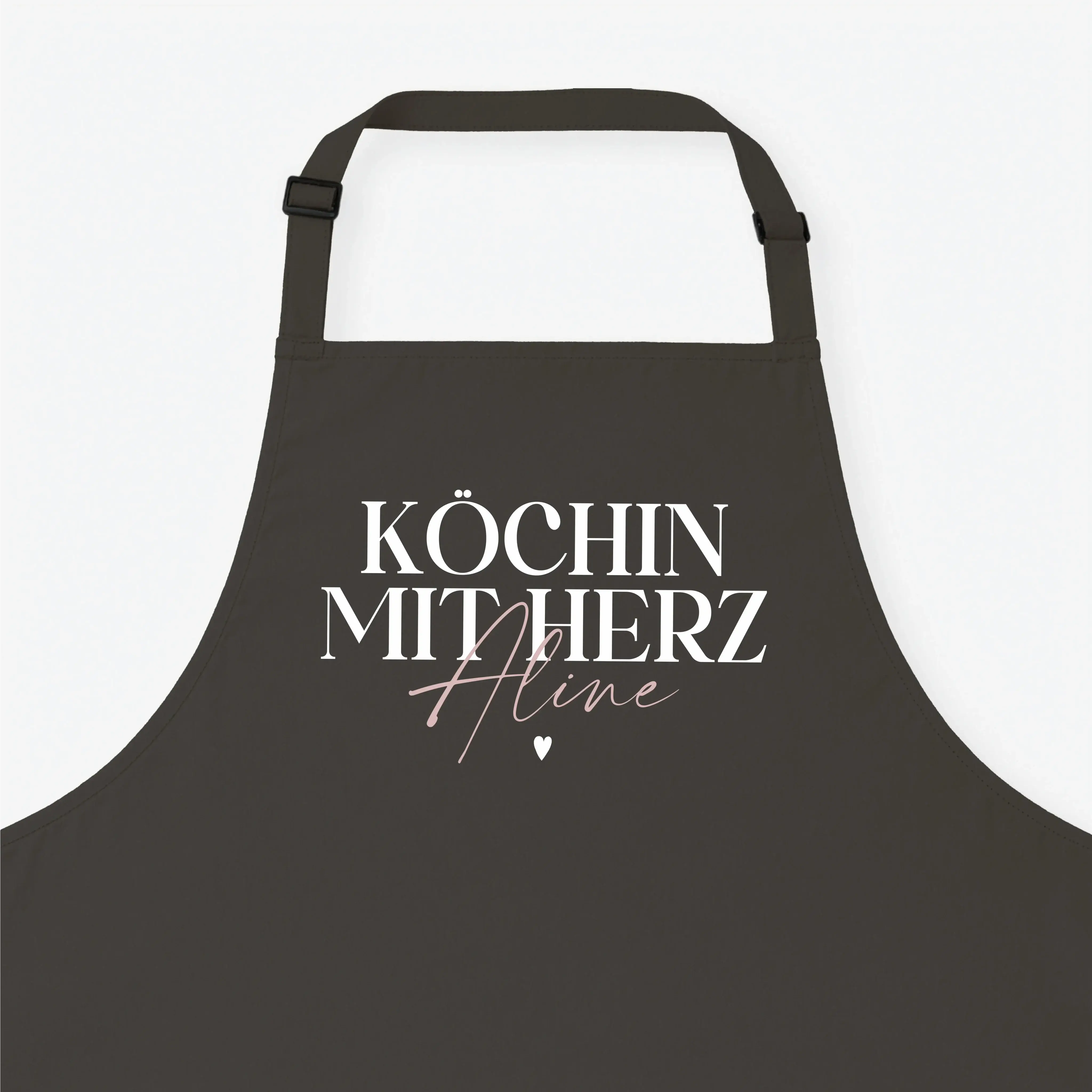 Kochschürze Köchin mit Herz-Kochschürze-famprints-Die Kochschürze Köchin mit Herz von famprints ist mehr als nur ein praktisches Küchenaccessoire. Sie wird zu einem persönlichen Lieblingsstück, das Kochen, Backen und Zubereiten begleitet. Mit deinem Wunsc