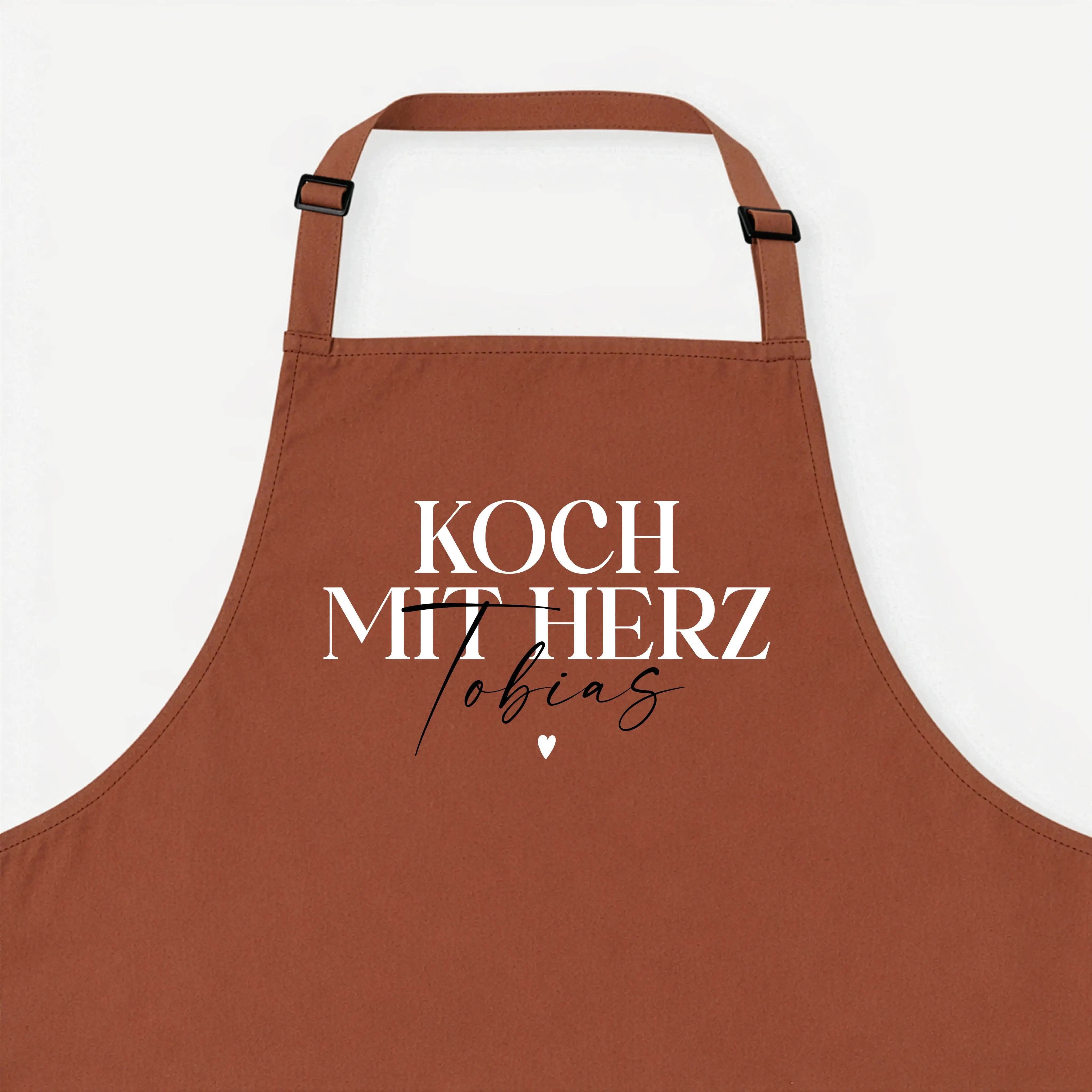 Kochschürze Koch mit Herz-Kochschürze-famprints-Kochschürze Koch mit Herz steht für Freude am Kochen und für eine persönliche Note, die man sofort sieht. Bei famprints wird aus einer hochwertigen Küchenschürze ein individuelles Geschenk, das genau zu dir