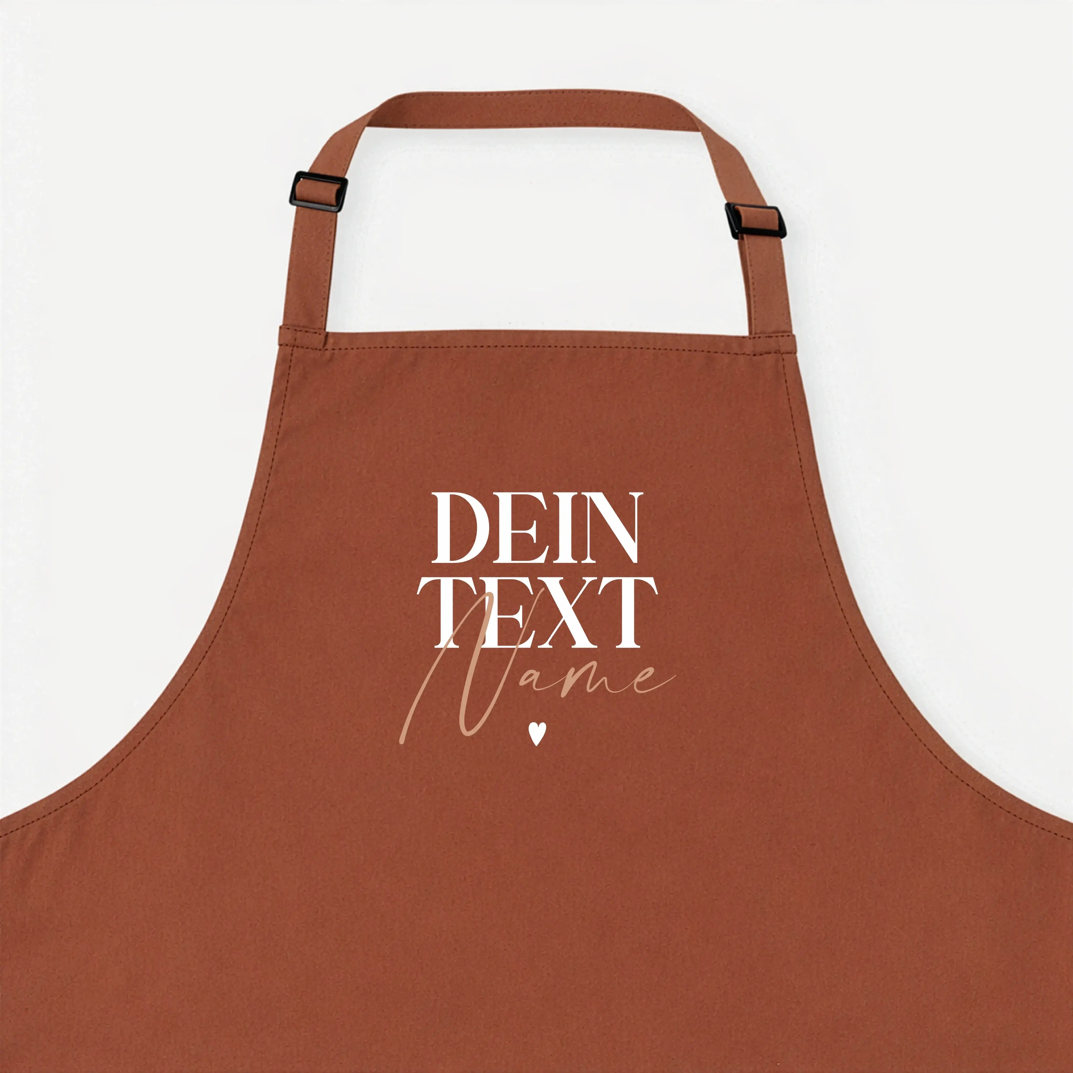 Kochschürze Dein Text-famprints-Kochschürze-Die Kochschürze Dein Text von famprints macht aus dem Kochen etwas Persönliches. Du gestaltest deine Schürze genau so, wie sie zu dir oder zur beschenkten Person passt. Ob Name, kurzer Spruch oder eine liebevoll