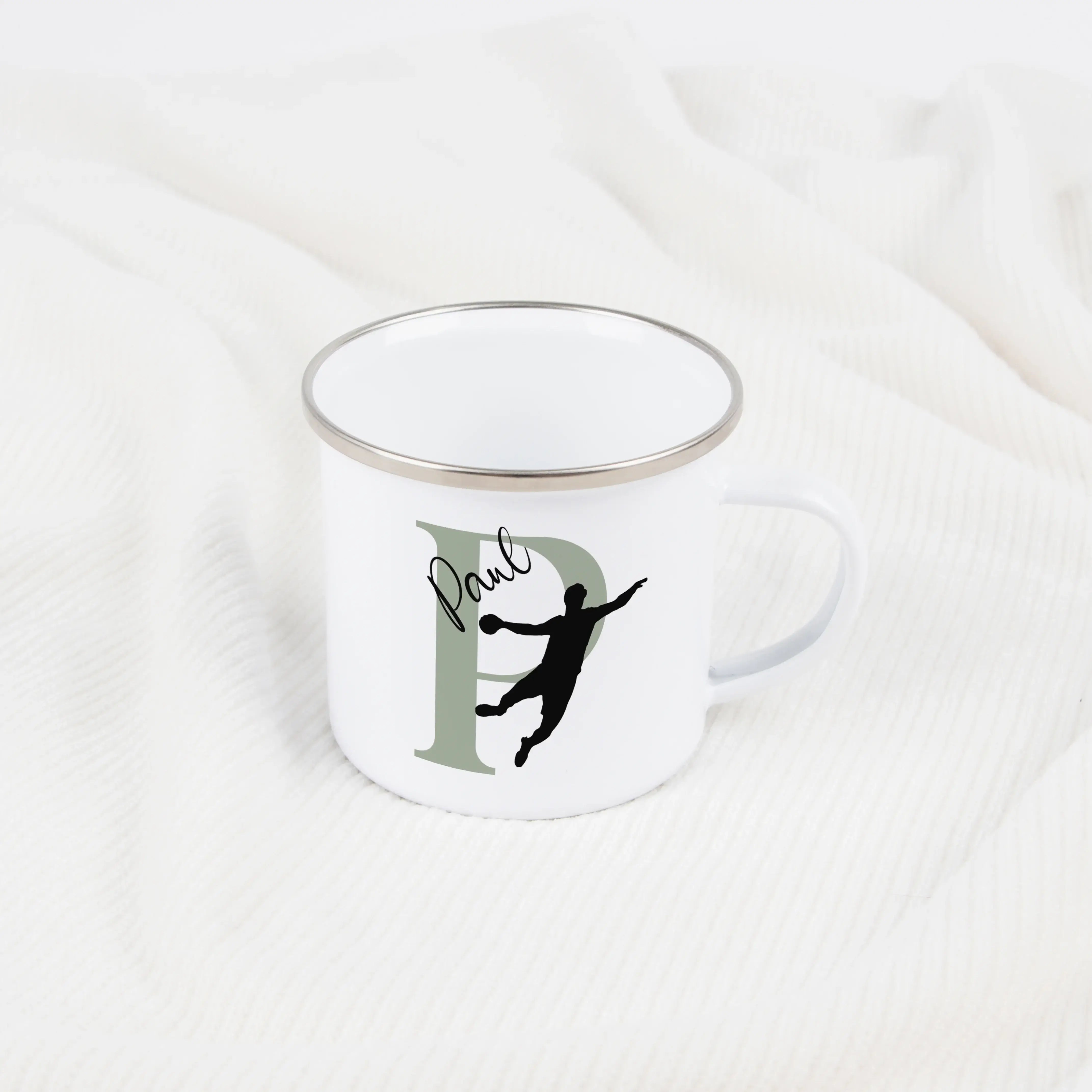 Emaille Tasse mit Namen Handball-Emaille Tasse-famprints-Die Emaille Tasse mit Namen Handball von famprints verbindet sportliche Leidenschaft mit einer persönlichen Note, die Kindern ein echtes Strahlen ins Gesicht zaubert. Jede Tasse wird in Deutschland