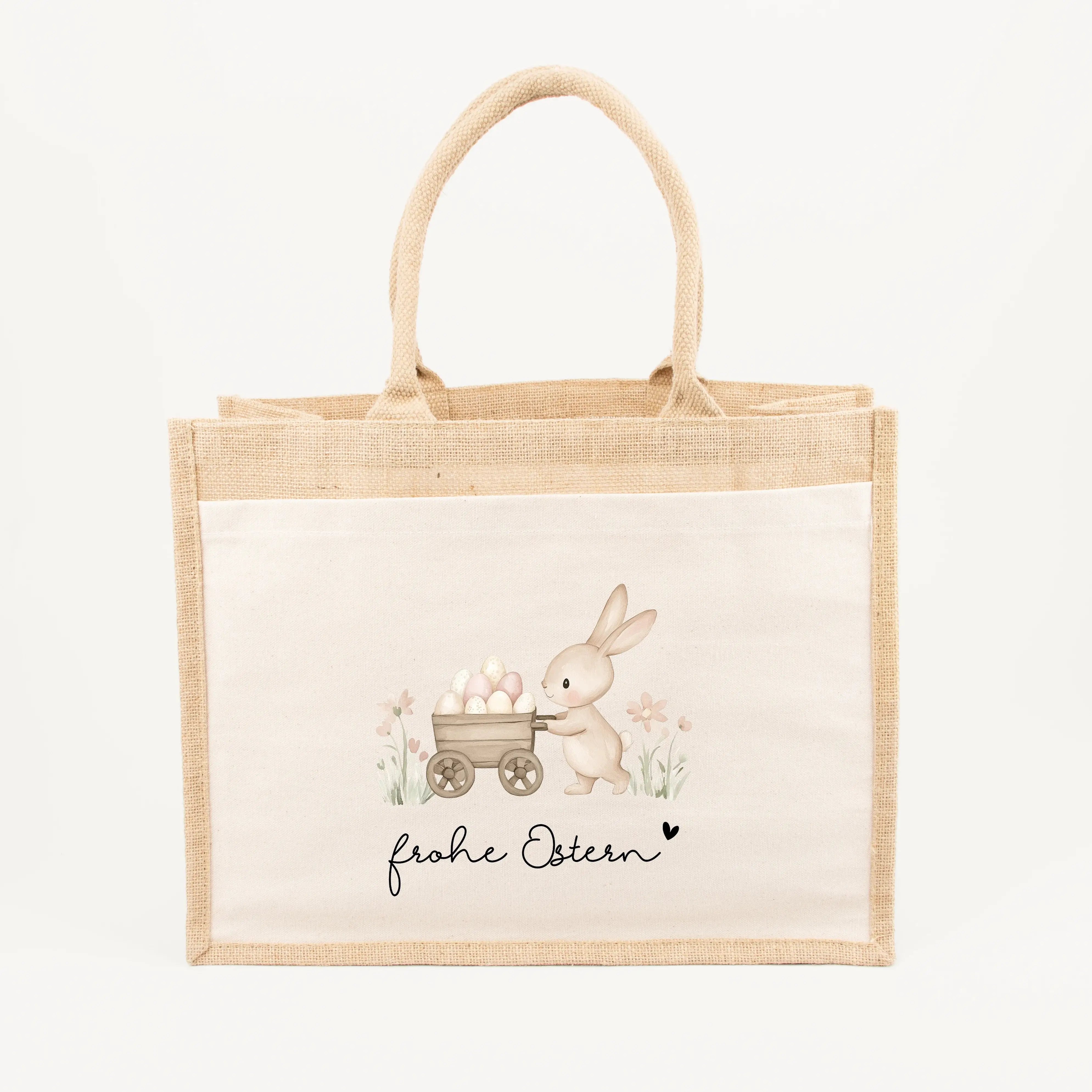 Jutetasche Frohe Ostern-Jutetasche-famprints-Die Jutetasche Frohe Ostern von famprints ist mehr als nur eine Oster Tasche – sie ist ein liebevolles Detail für dein Osterfest. Ob als Geschenkverpackung für kleine Präsente, als Ostergeschenk für Kinder oder
