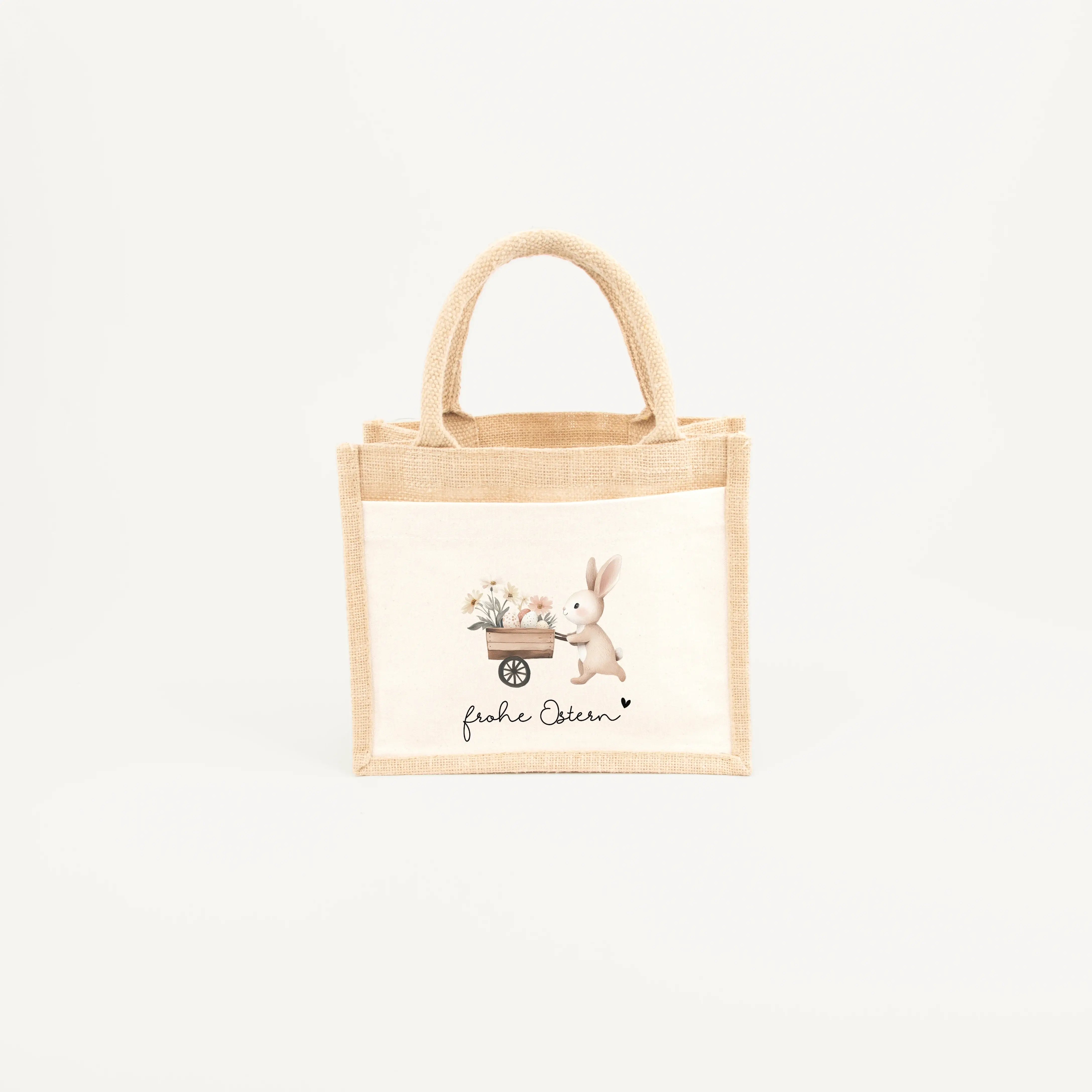 Jutetasche Frohe Ostern-Jutetasche-famprints-Die Jutetasche Frohe Ostern von famprints ist mehr als nur eine Oster Tasche – sie ist ein liebevolles Detail für dein Osterfest. Ob als Geschenkverpackung für kleine Präsente, als Ostergeschenk für Kinder oder