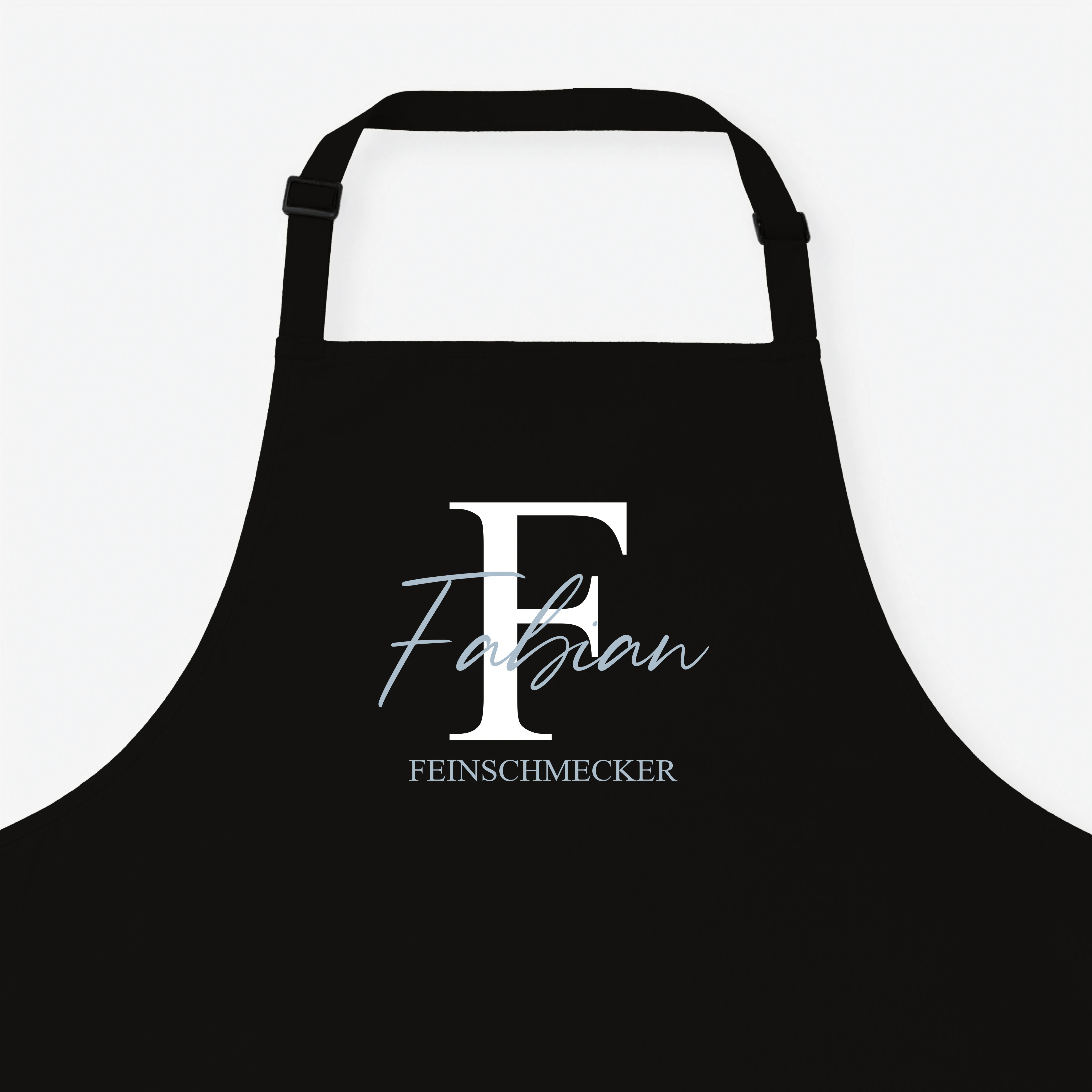 Kochschürze Initial + Text-Kochschürze-famprints-Die Kochschürze Initial + Text von famprints macht aus einem Alltagsprodukt ein persönliches Statement für Küche, Grill oder Backstube. Dein gewähltes Initial bildet den Mittelpunkt des Designs und wird mit