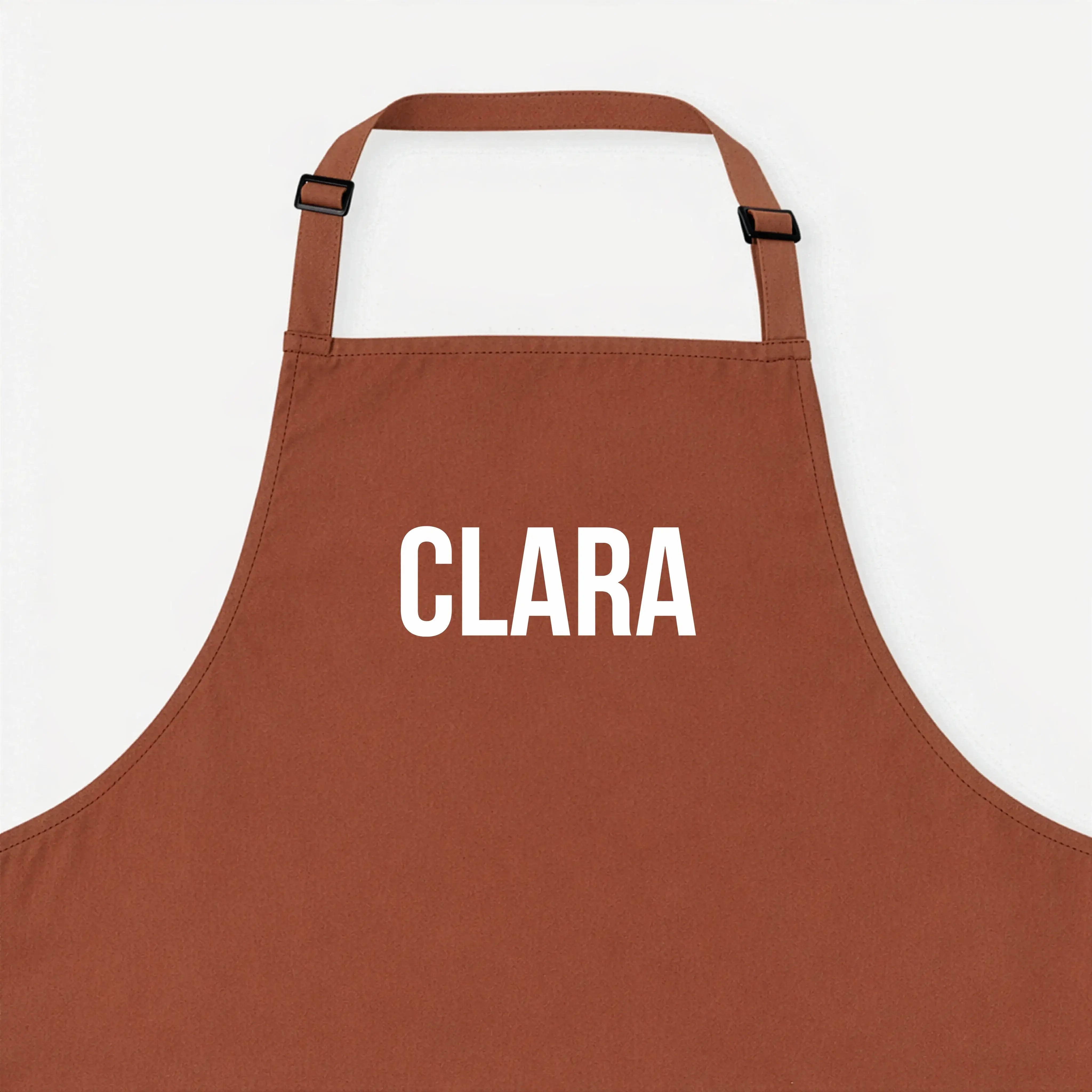 Kochschürze mit Namen-Kochschürze-famprints-Eine Kochschürze mit Namen macht aus jedem Kochmoment etwas Persönliches. Bei famprints gestaltest du deine personalisierte Kochschürze genau so, wie sie zu dir oder zur beschenkten Person passt. Ob dezente Schr