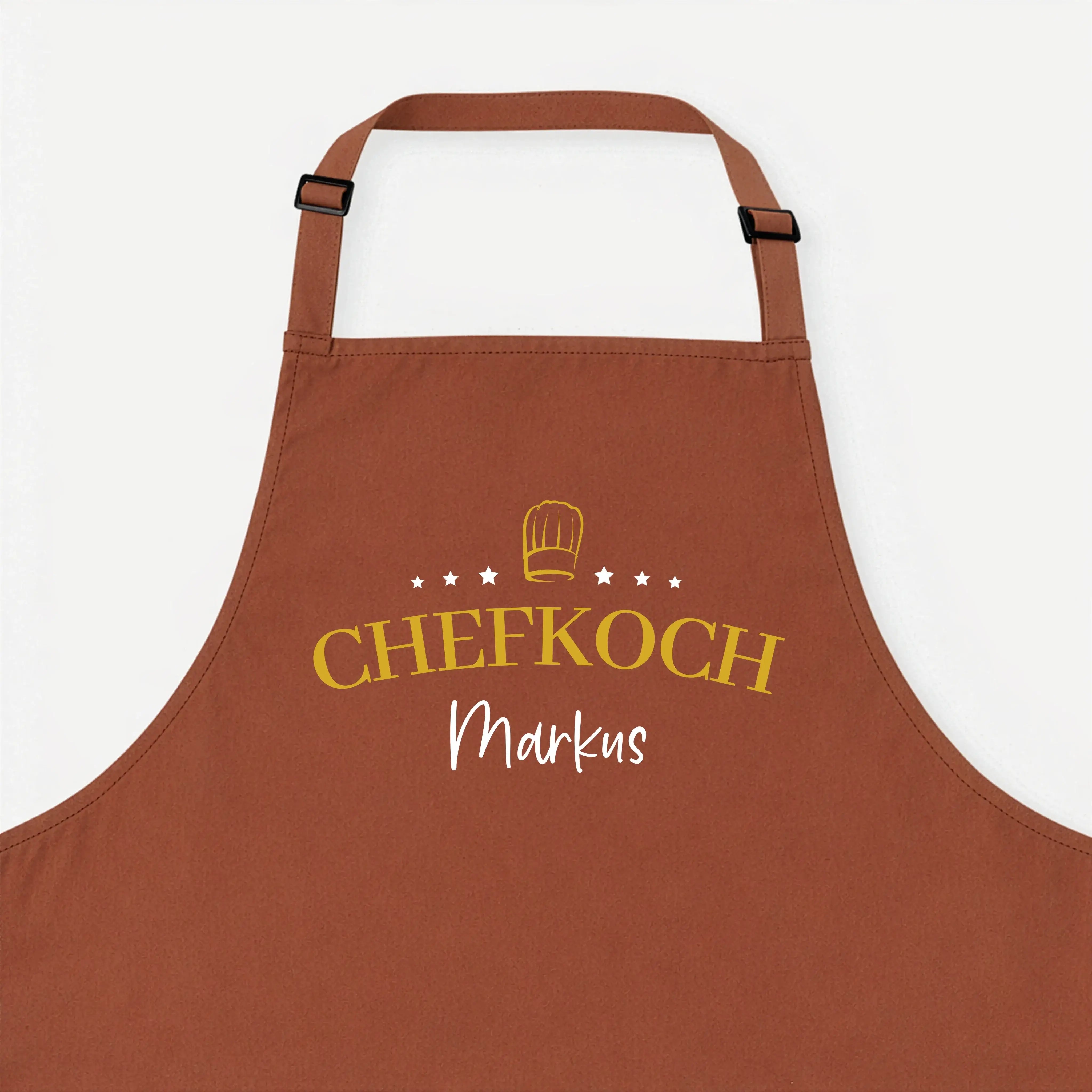 Kochschürze Chefkoch Sterne-Kochschürze-famprints-Die Kochschürze Chefkoch Sterne ist das perfekte Geschenk für alle, die gern am Herd stehen und dabei Persönlichkeit zeigen wollen. Mit dem markanten Chefkoch Schriftzug, den Sternen und der edlen Kochmütz