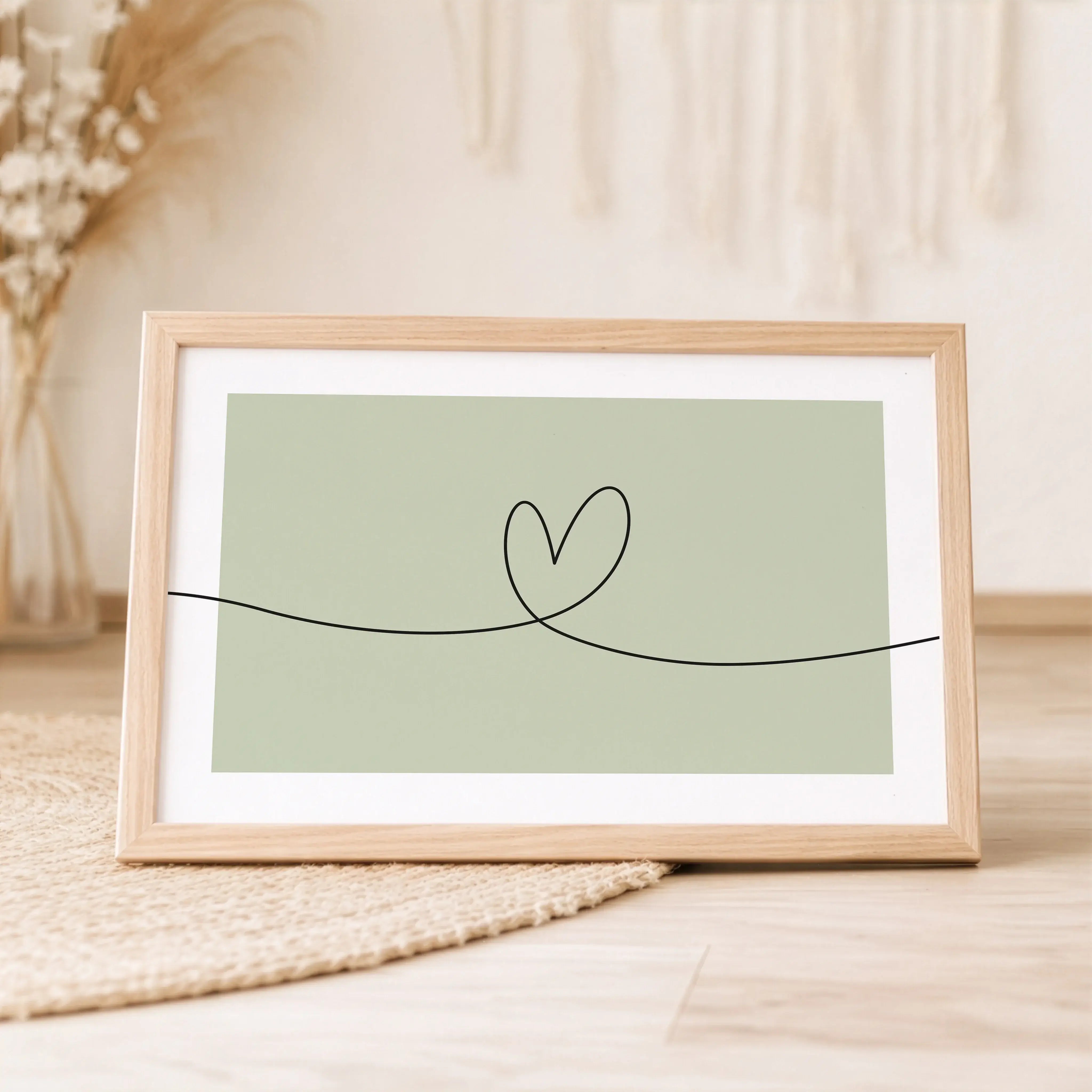Herzlinie Poster No2-Poster-famprints-Das Herzlinie Poster No2 ist ein modernes Line Art Poster mit klarer Linienführung. Eine schwarze, durchgehende Linie verläuft von links nach rechts über das gesamte Motiv und formt in der Mitte eine schlichte Herzkon